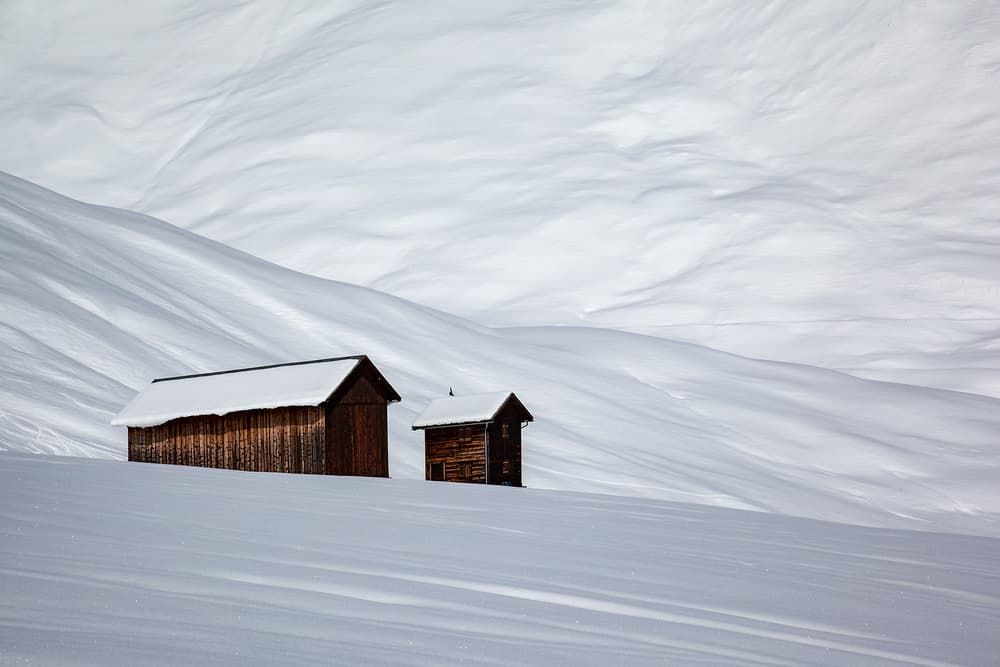 Rustic Winter Cabins by Uschi Hermann — canvas wall art