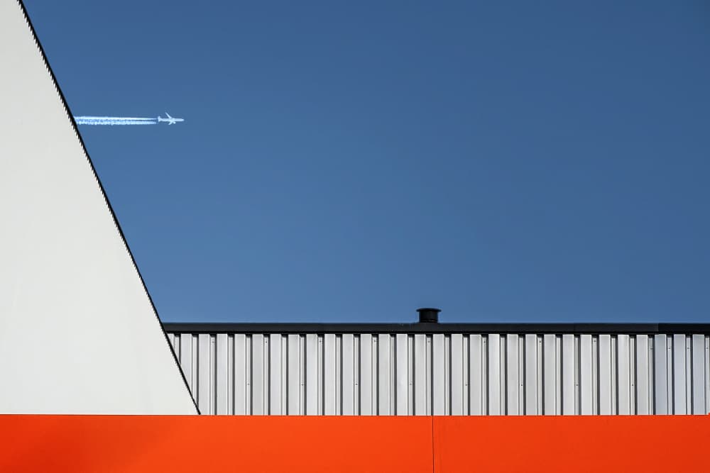 Airplane Blue Geometric Sky by Henk van Maastricht — canvas wall art