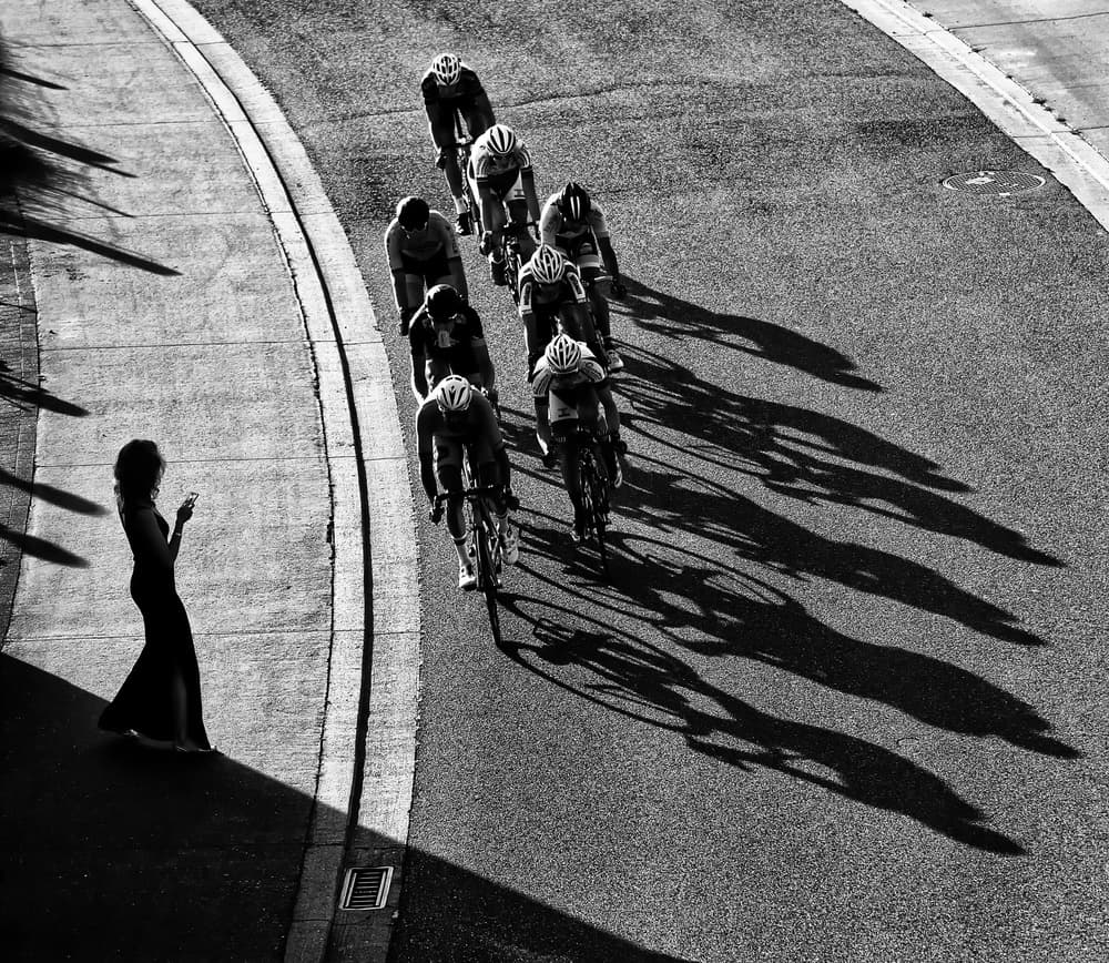 Cyclists and Long Shadows by Lou Urlings — canvas wall art