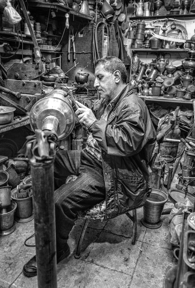 Skilled Coppersmith At Work by Bashar Alsofey — canvas wall art