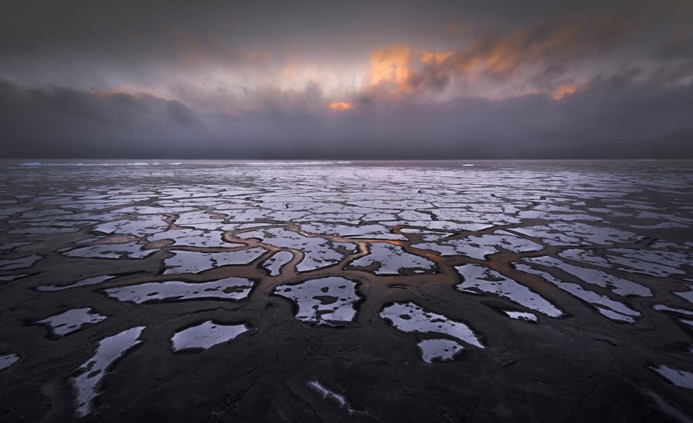 Golden Light Over Ice by Larry Deng APA — canvas wall art
