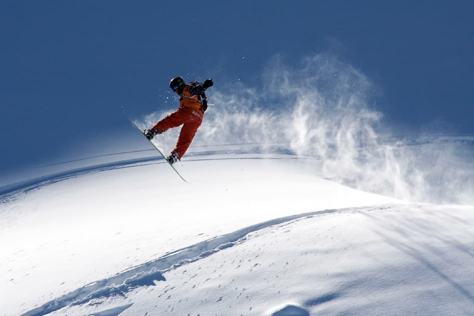 Snowboarder in Flight by Evgeny Vasenev — canvas wall art