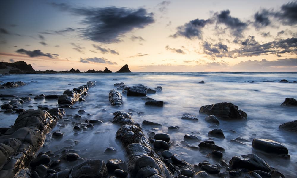 Twilight Ocean Rocks by Radojica Jevric fotorax — canvas wall art