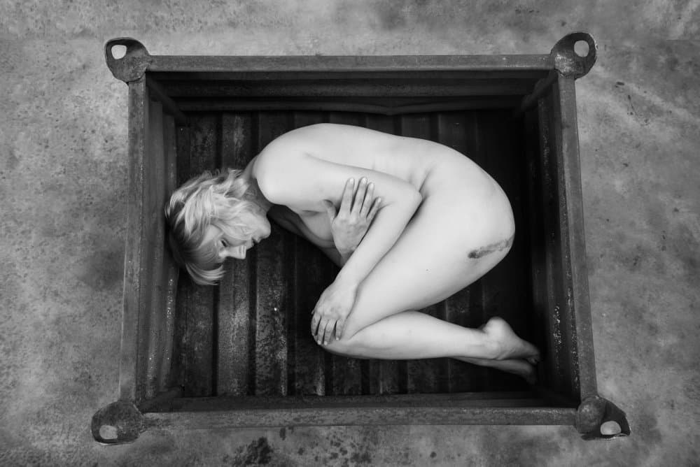 Curled Nude In Crate by Axel K. Schoeps — canvas wall art