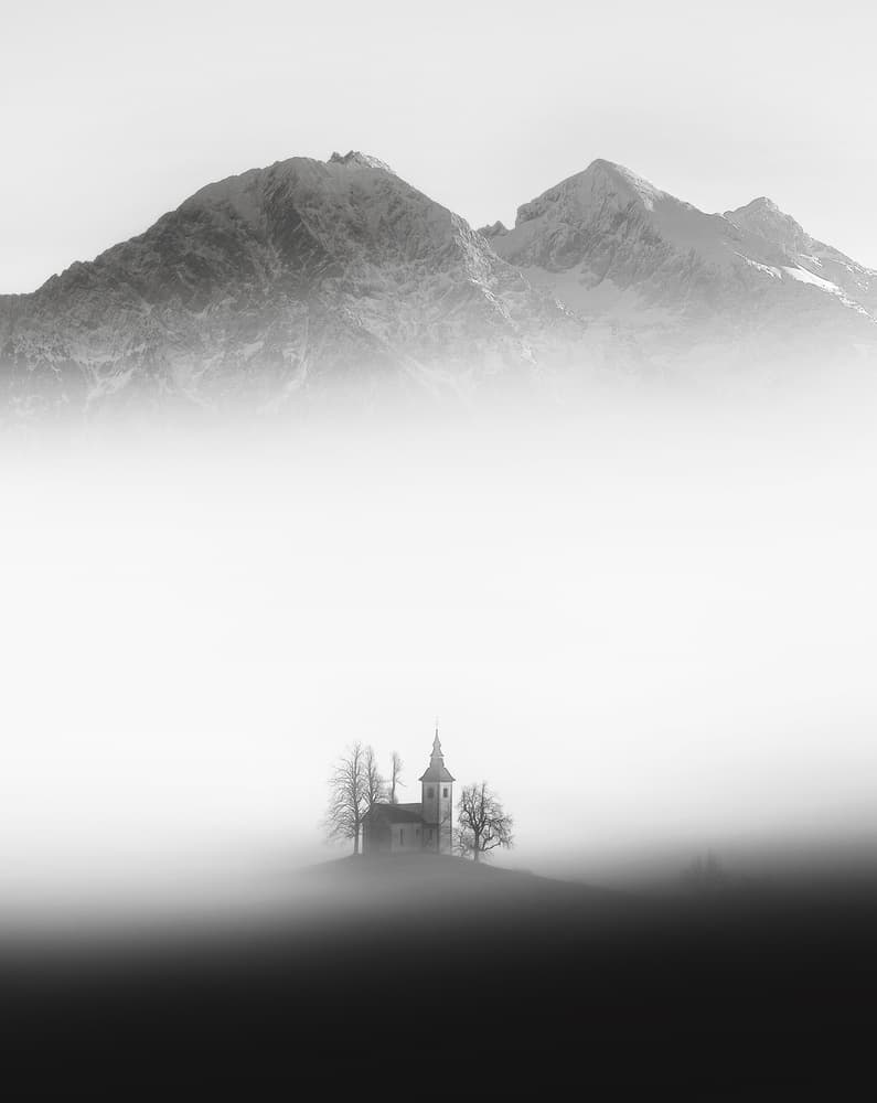 Misty Alpine Church by Ales Krivec — canvas wall art