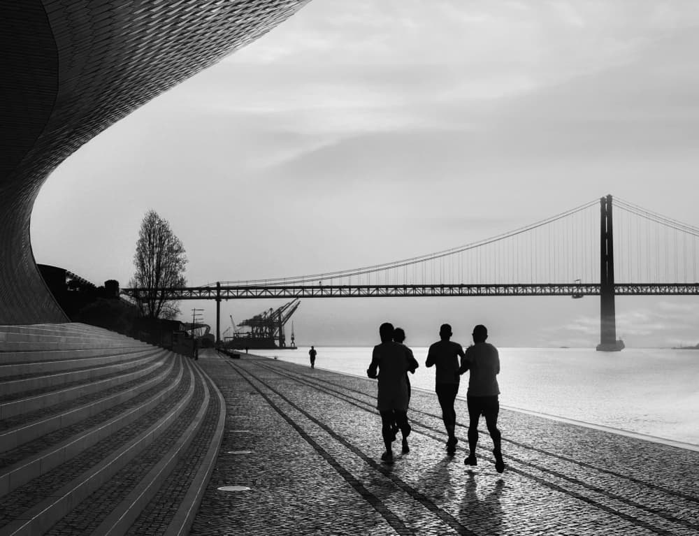 Waterfront Jogging Silhouettes by Yanyan Gong — canvas wall art