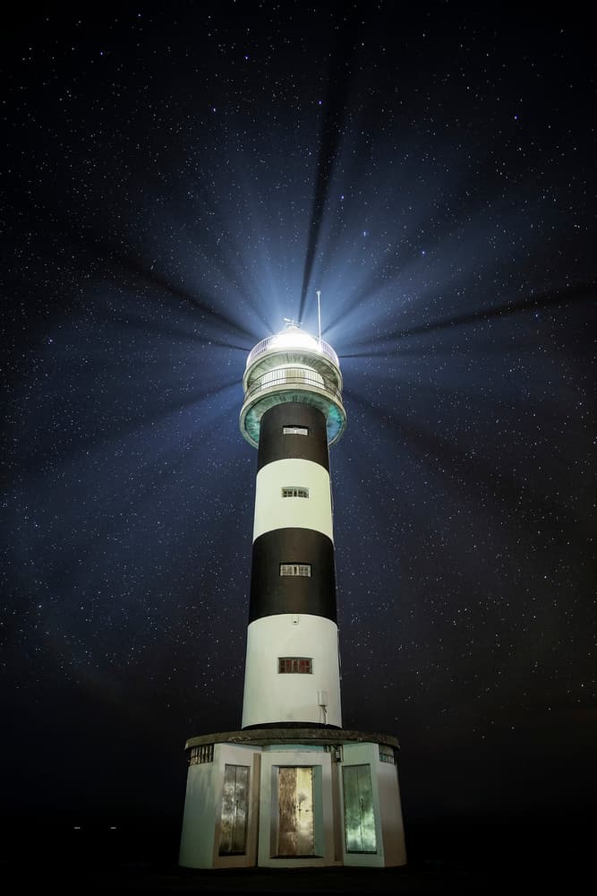 Starry Night Lighthouse by Alejandro Garcia Bernardo — canvas wall art