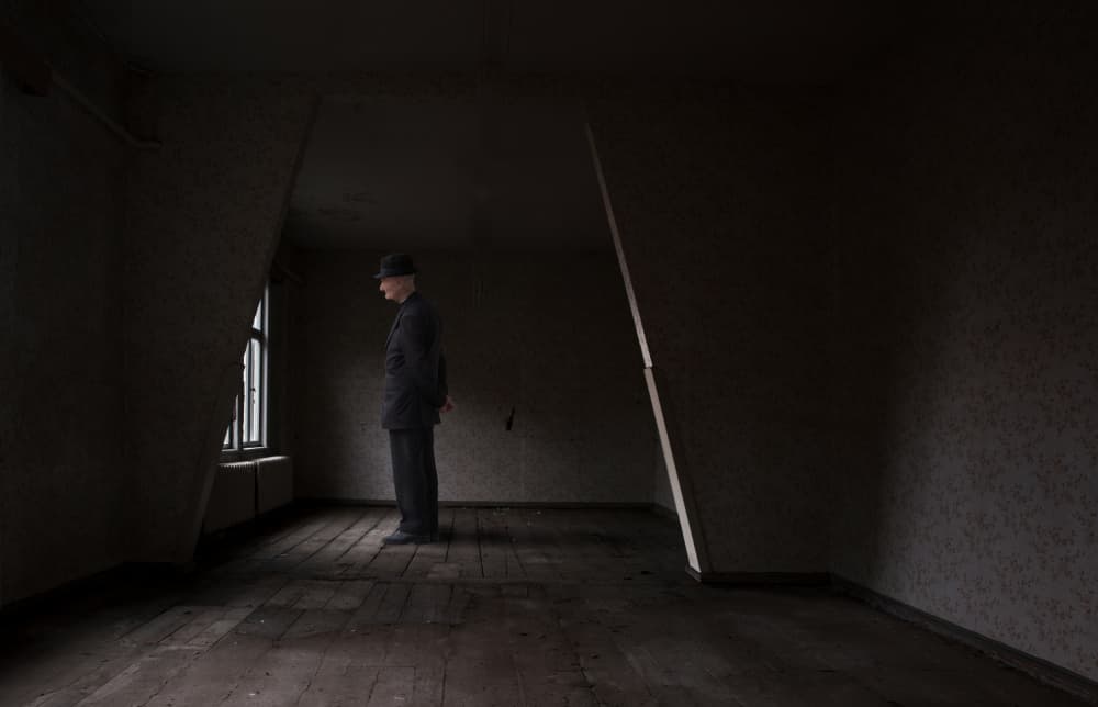 Pensive Man Empty Room by Hans Günther — canvas wall art