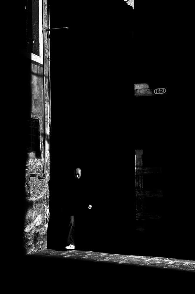 Man Walking Through Shadows by Antonio Grambone — canvas wall art