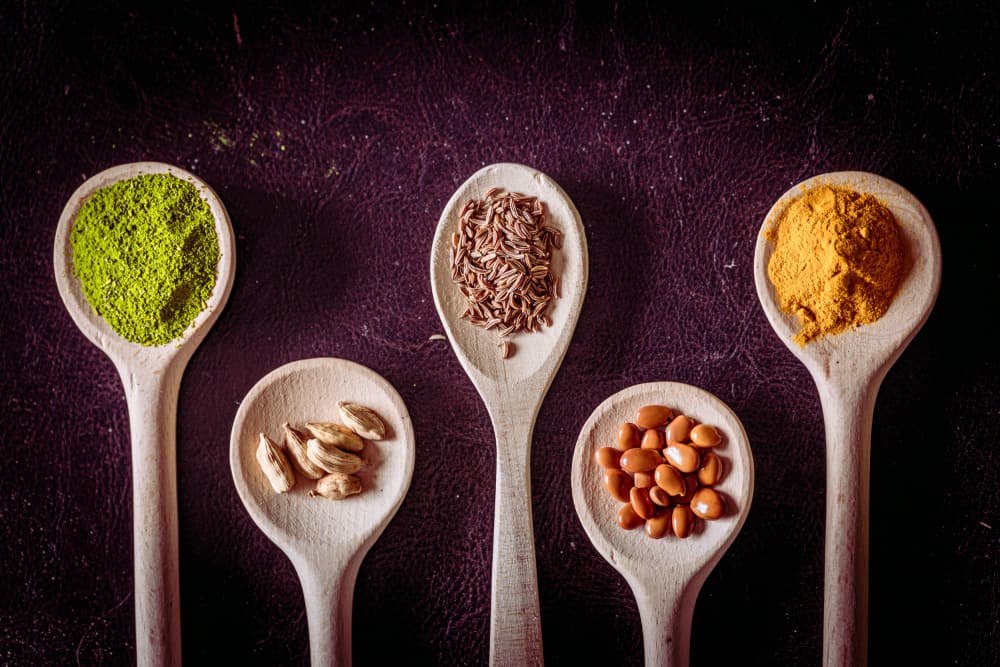 Colorful Spices on Spoons by Marija Kordić — canvas wall art