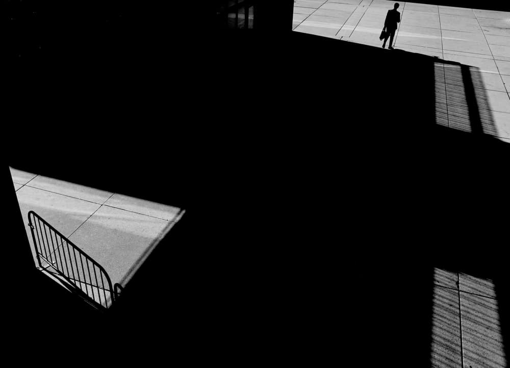 Man in Geometric Shadows by Jian Wang — canvas wall art
