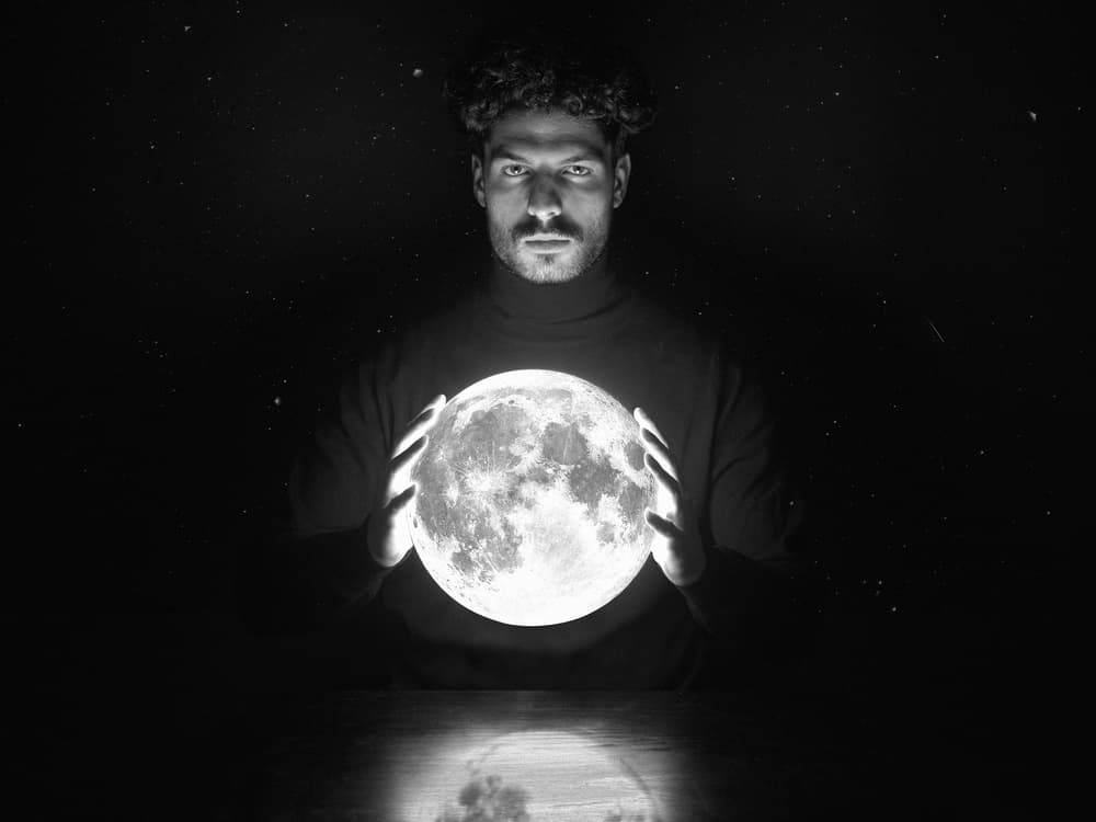 Cosmic Man Holding Moon by Giacomo Bruno — canvas wall art