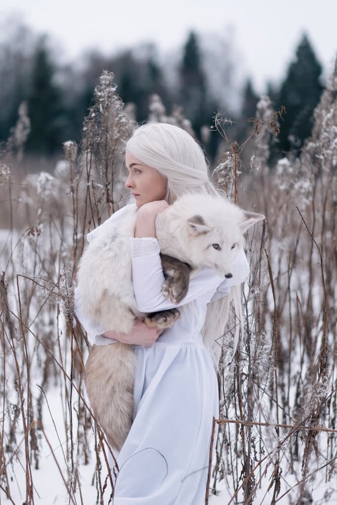 Woman With White Fox by Olga Barantseva — canvas wall art