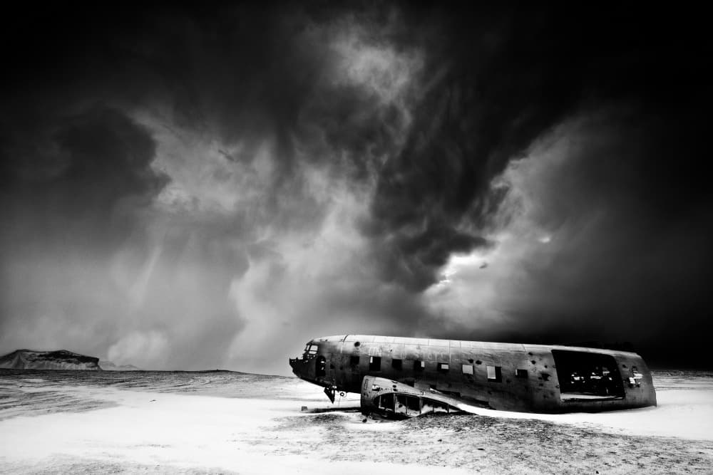 Abandoned Plane Under Storm by Trevor Cole — canvas wall art
