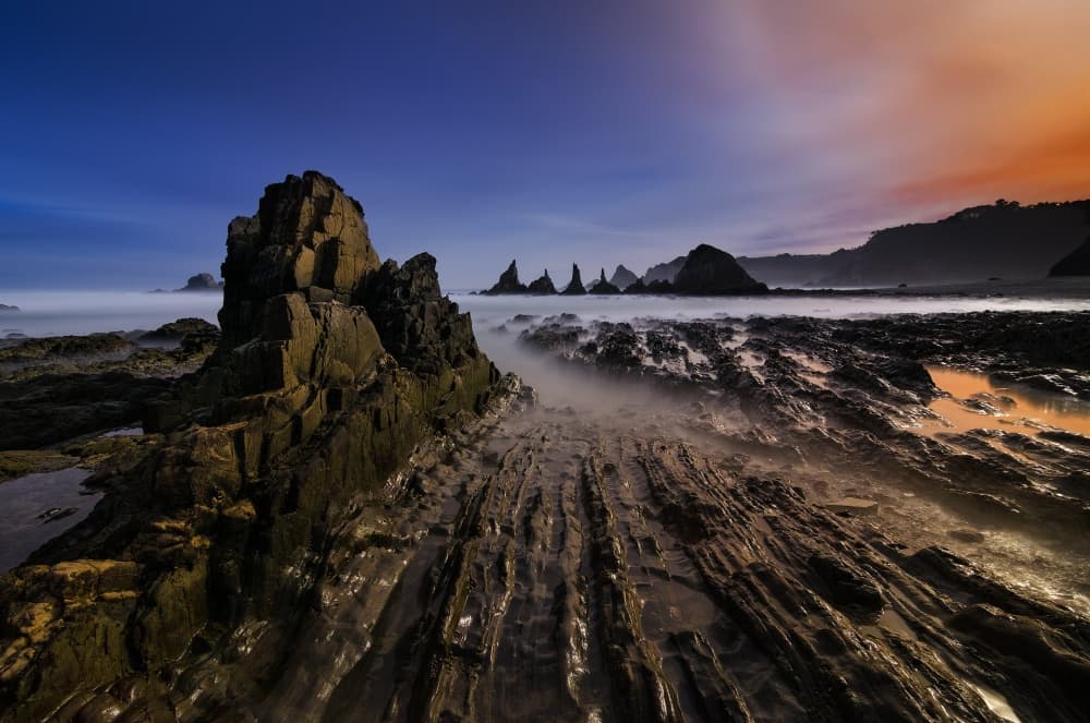 Twilight Ocean Rocks by Alberto García — canvas wall art
