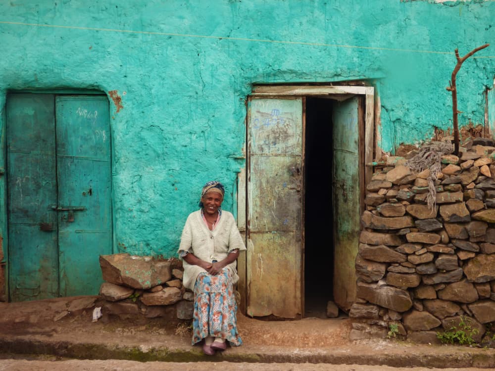 Smiling Woman Teal Home by Ilana Lam — canvas wall art
