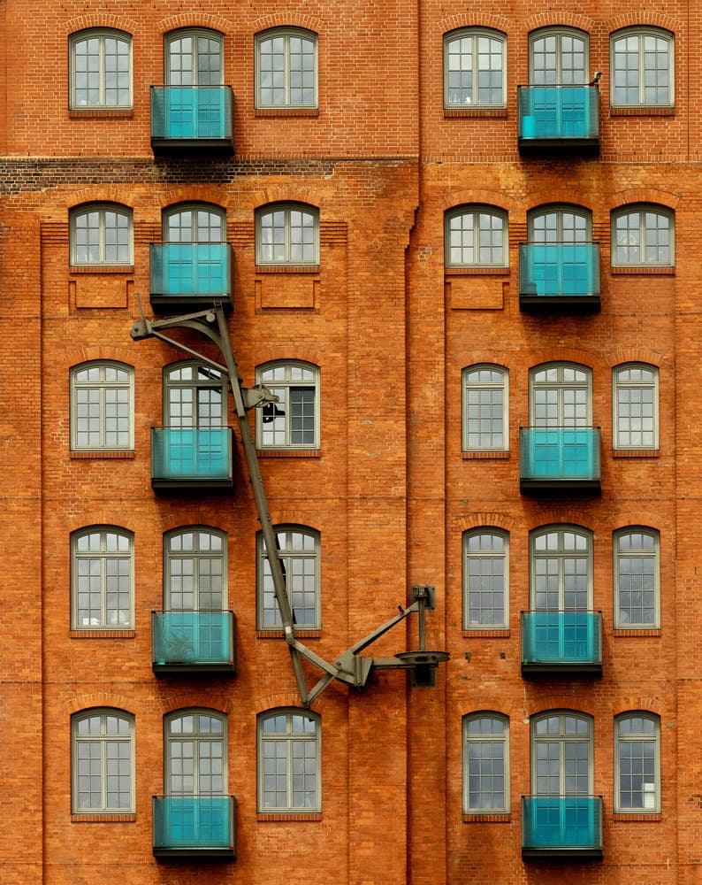 Urban Brick Balconies by Jutta Kerber — canvas wall art