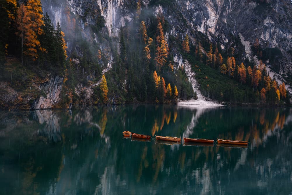 Misty Autumn Lake Boats by Andreea Selagea — canvas wall art