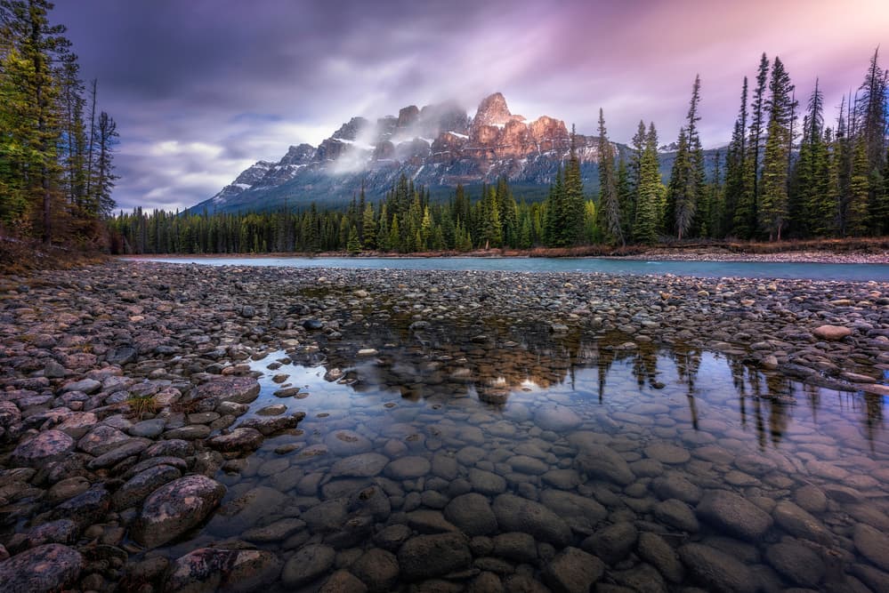 Sunlit Mountain Peaks Reflection by Jorge Ruiz Dueso — canvas wall art