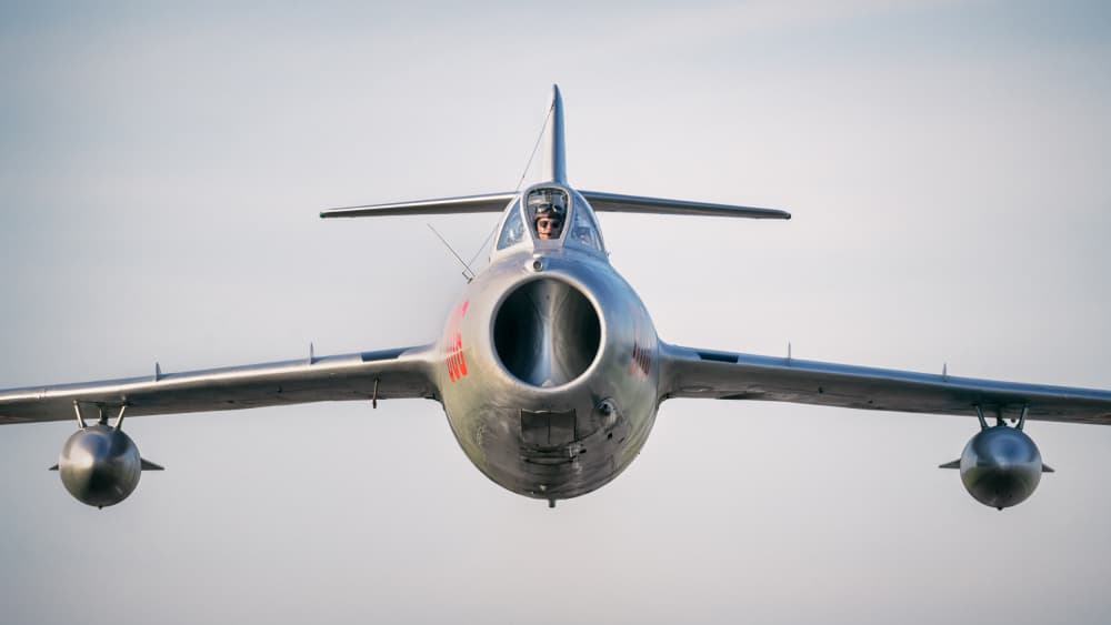 Vintage Jet Fighter Flight by Piotr Wrobel — canvas wall art