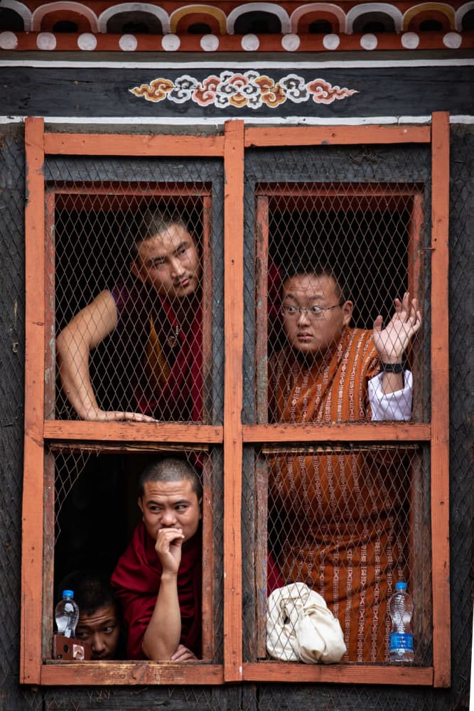 Bhutan Monks at Window by Ella Waldman — canvas wall art