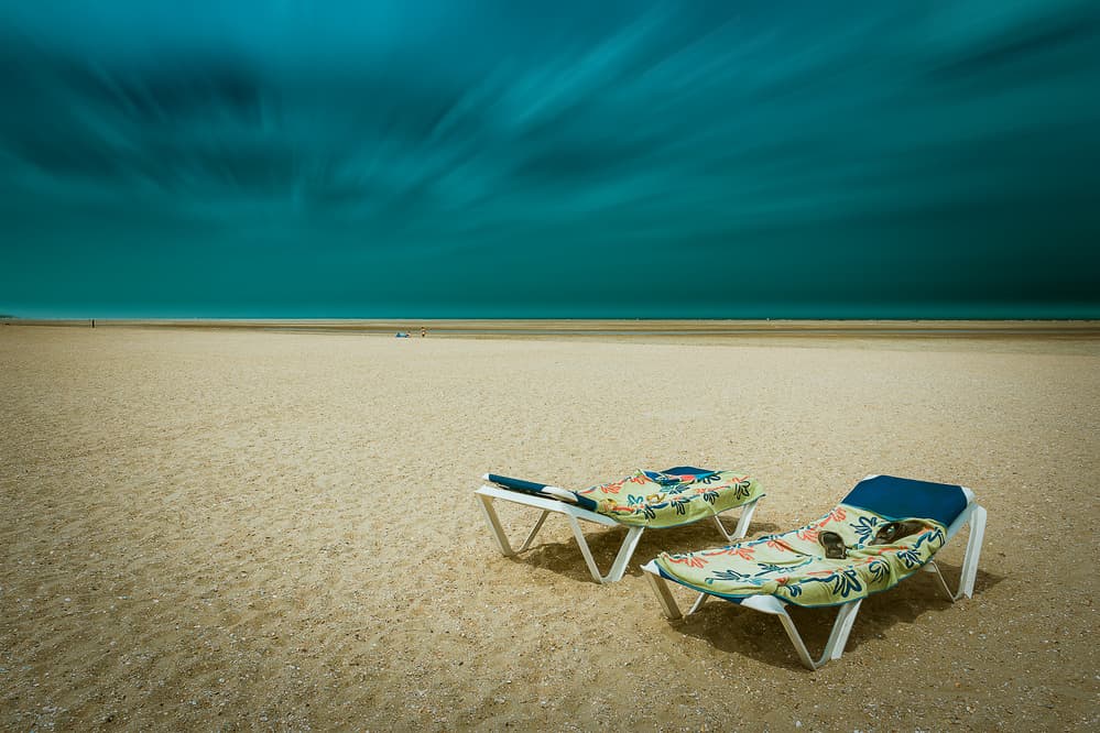 Teal Sky Beach Loungers by Bernardine de Laat — canvas wall art