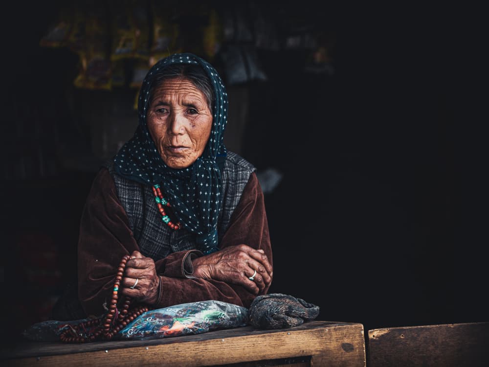 Contemplative Elderly Woman by Marco Tagliarino — canvas wall art