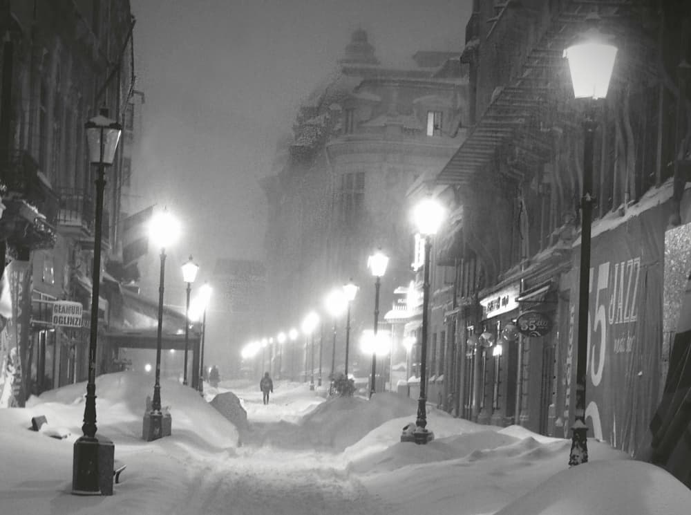 Snowy City Night by Cristian Andreescu — canvas wall art