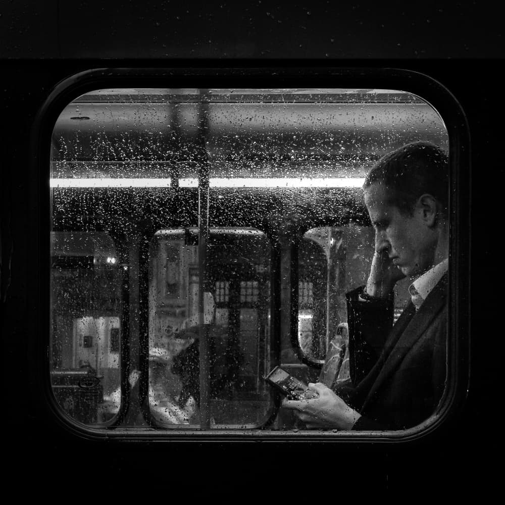 Pensive Commuter in Rain by Selaru Ovidiu — canvas wall art