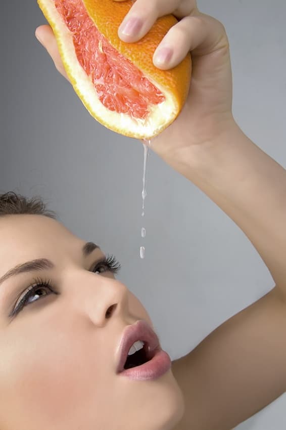 Fresh Grapefruit Drips by Silaevk — canvas wall art