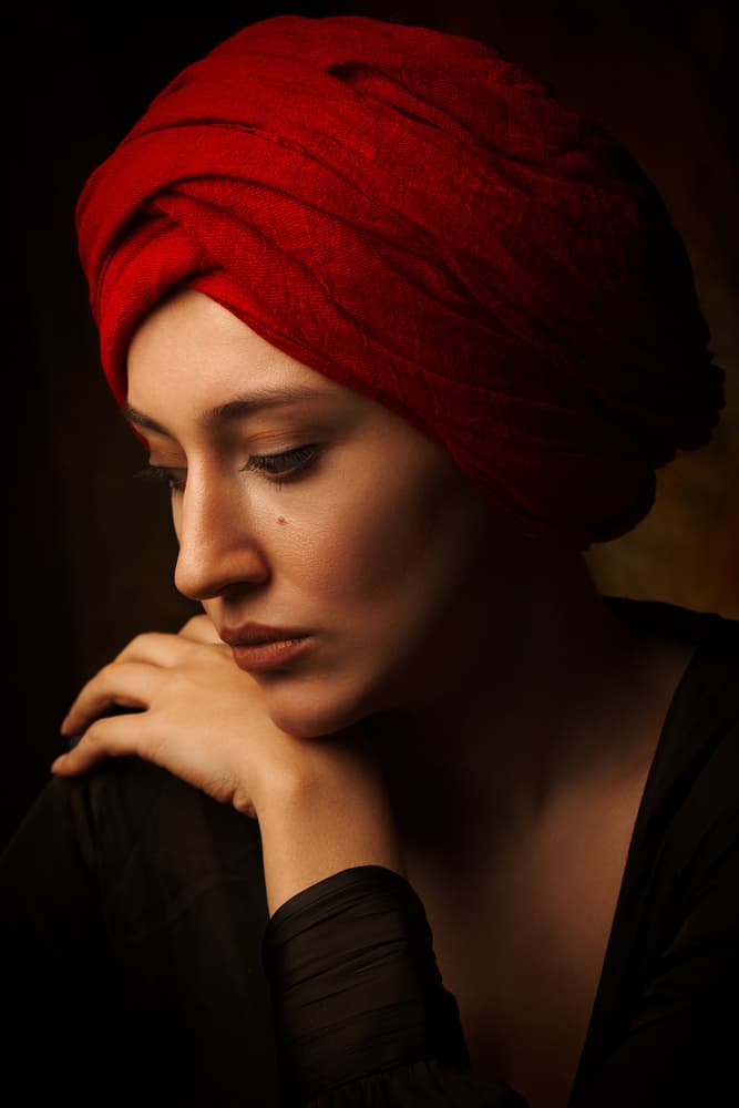 Contemplative Red Turban by Mehdi Mokhtari — canvas wall art