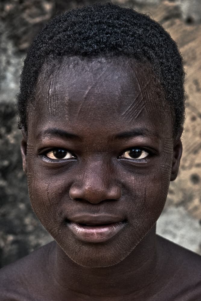 Child With Tribal Marks by Mark Boyle — canvas wall art