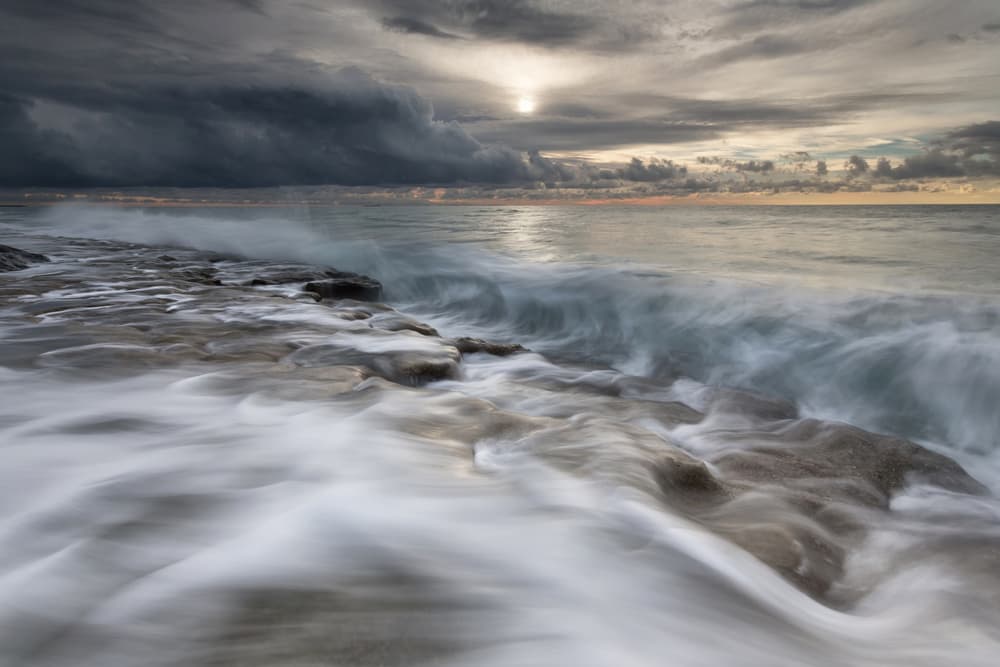 Flowing Ocean Rocks by Paolo Bolla — canvas wall art
