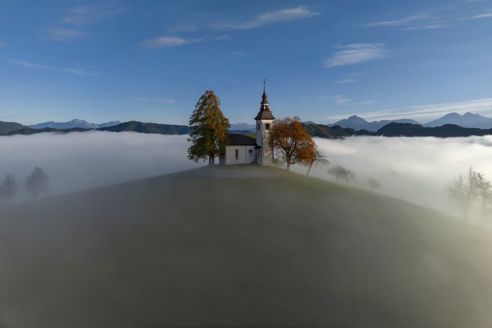 Misty Hilltop Church by Jure Kravanja — canvas wall art