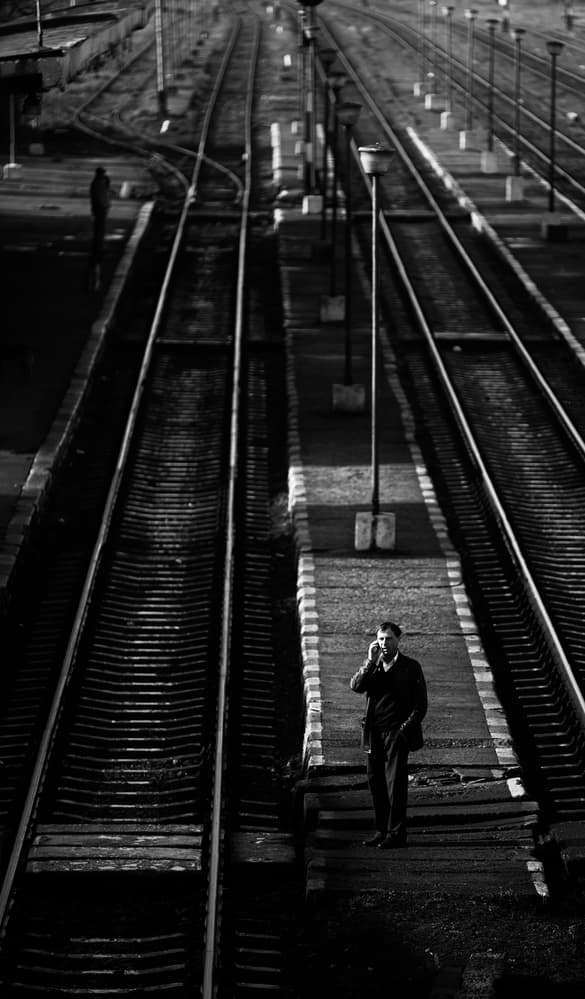 Man on Train Platform by Julien Oncete — canvas wall art