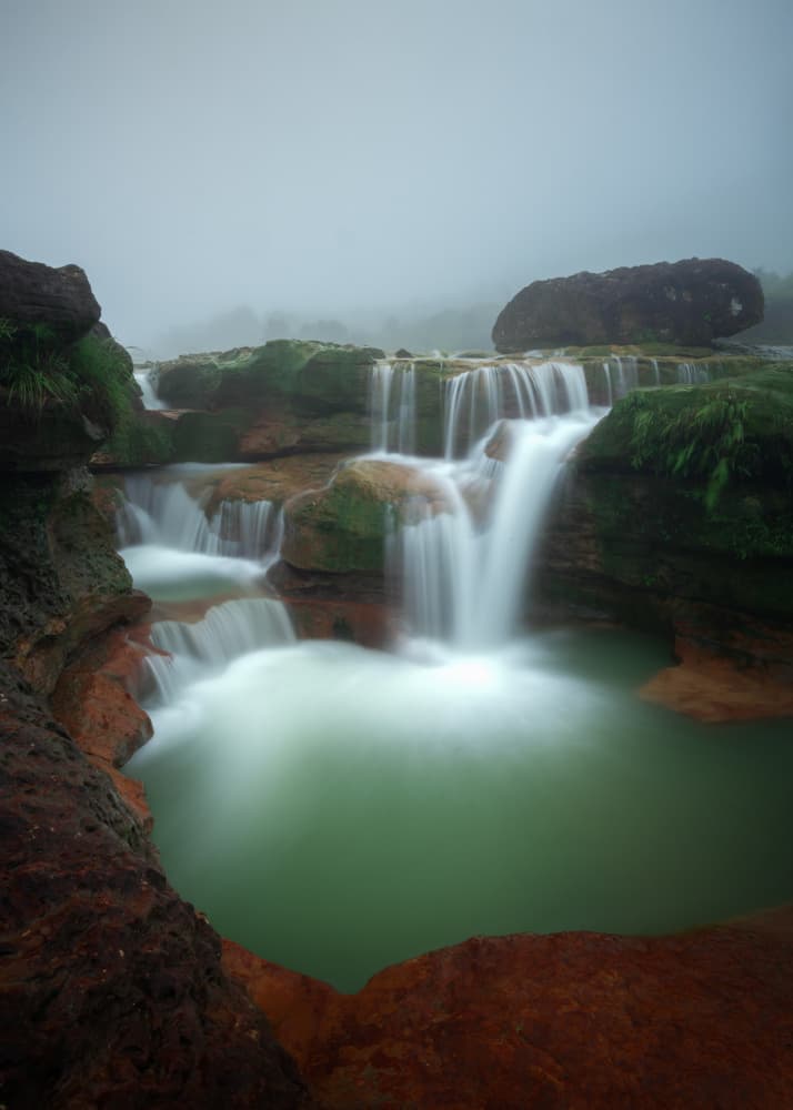Misty Green Waterfalls by Ramamurthi Palaniraman — canvas wall art