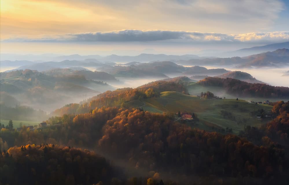Misty Autumn Hills by Ales Komovec — canvas wall art
