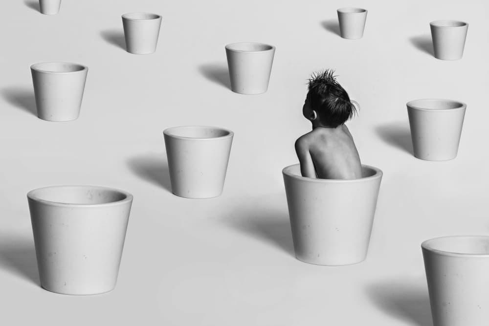 Child Among White Pots by Karim Aboukelela — canvas wall art