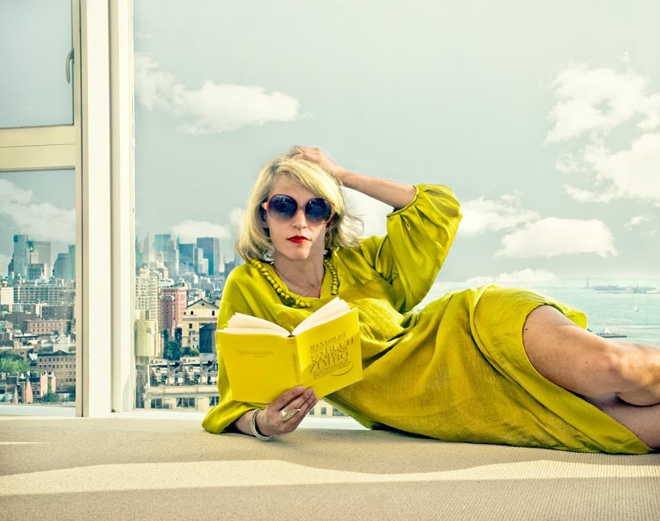 Woman Reading City Skyline