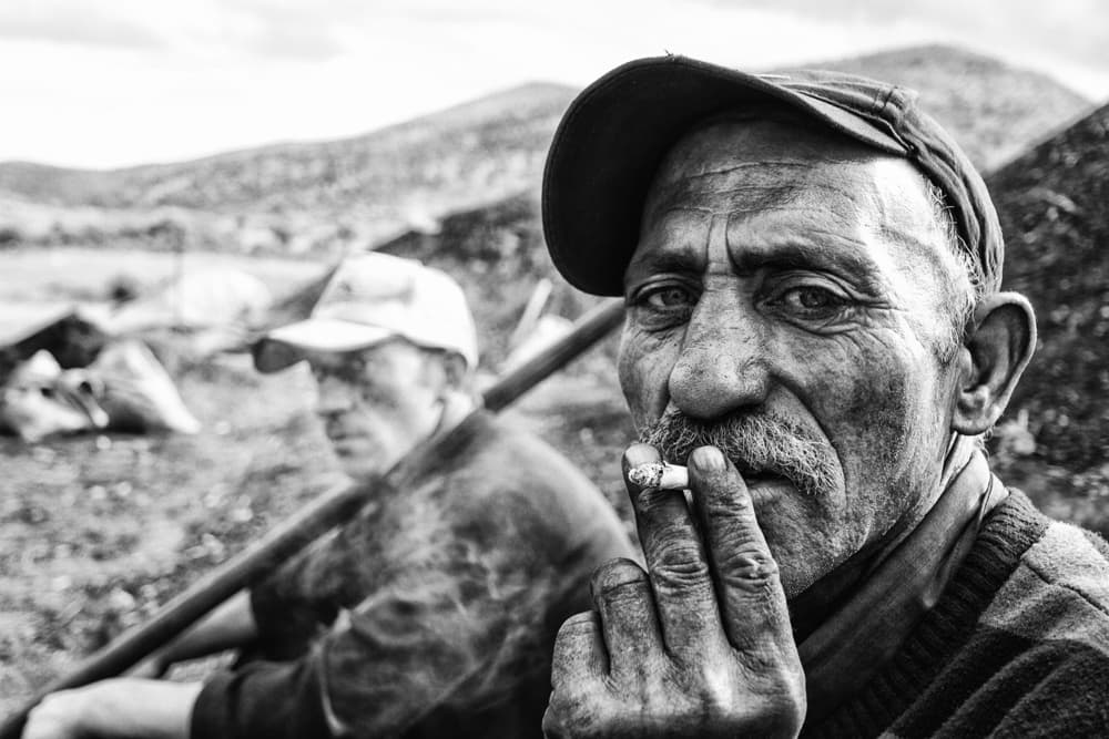 Weathered Man Smoking by Feyzullah Tunç — canvas wall art