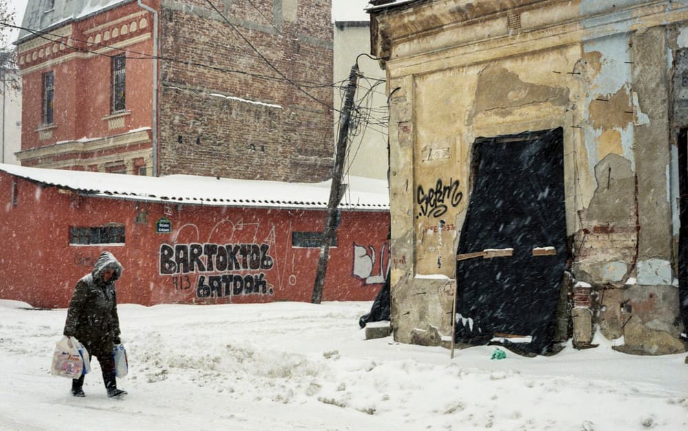Snowy Urban Walk by Sorin Vidis — canvas wall art