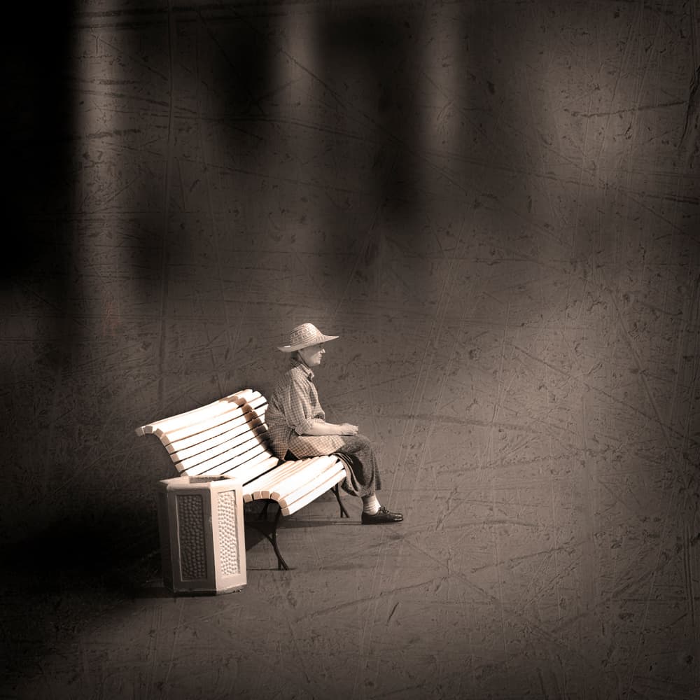 Pensive Figure on Bench by Evgenii Novichikhin — canvas wall art