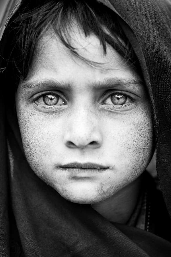 Intense Young Gaze by Ali Khataw — canvas wall art