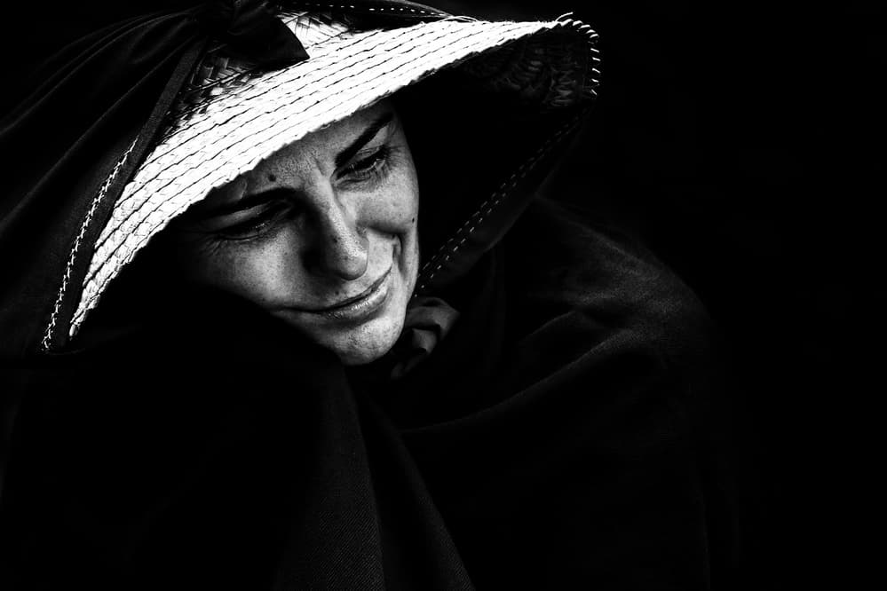Pensive Woman In Hat by Paulo Medeiros — canvas wall art
