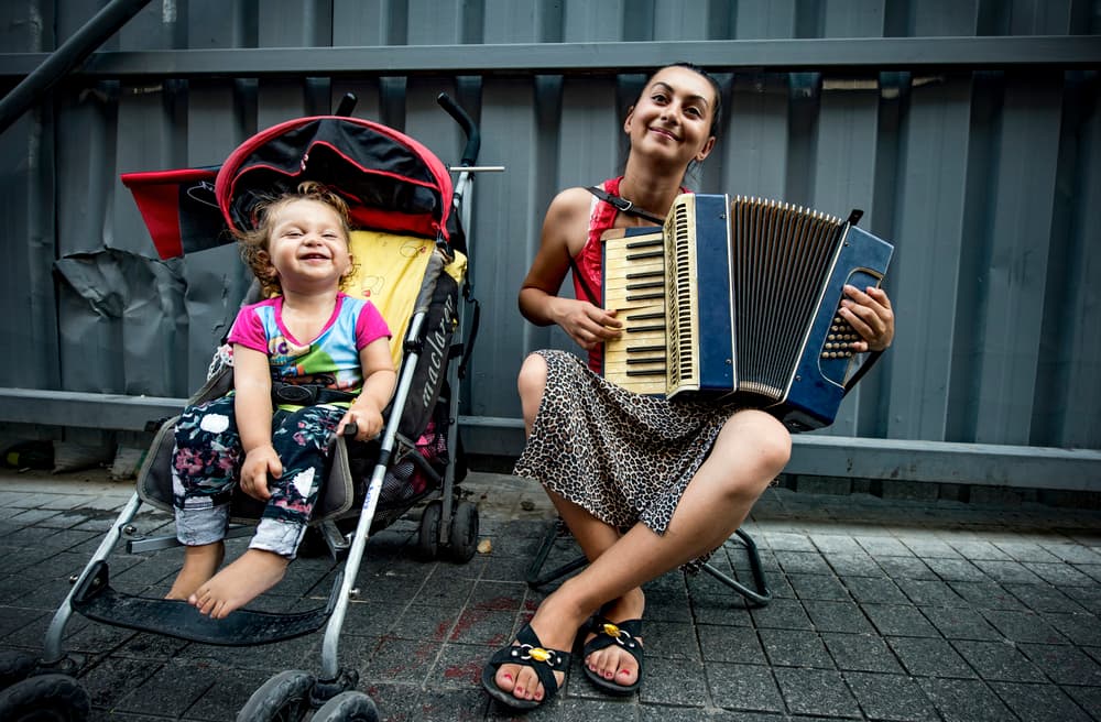 Joyful Street Musicians by Ibrahim Canakci — canvas wall art