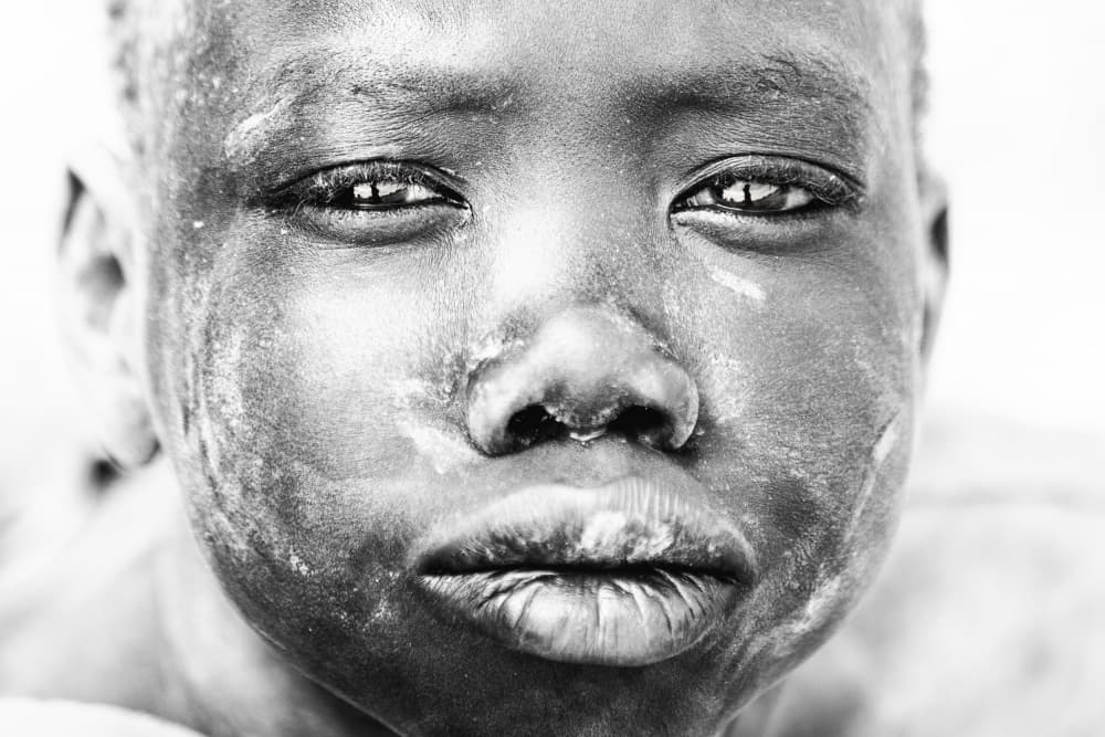 Child's Solemn Gaze by Svetlin Yosifov — canvas wall art