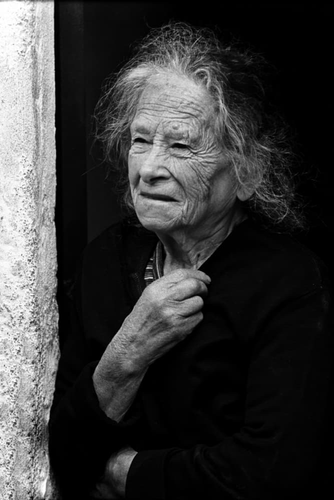 Pensive Old Woman by Eduardo Perez Sanchez — canvas wall art