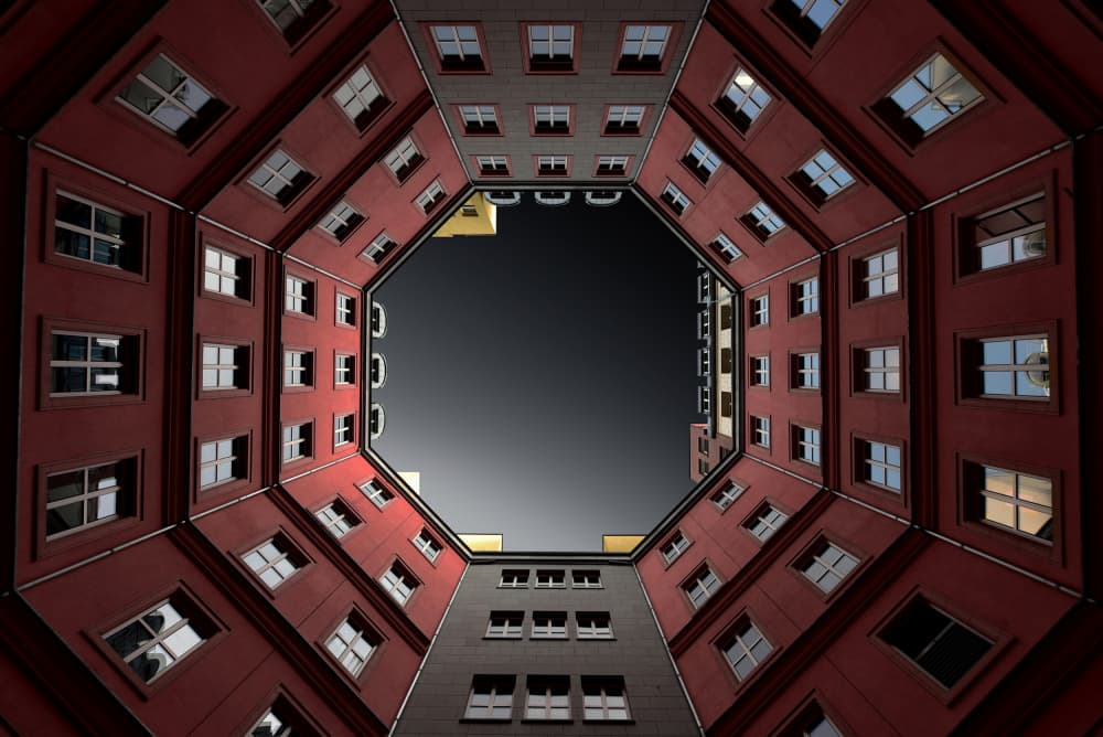 Geometric City Courtyard by Jorge Pimenta — canvas wall art