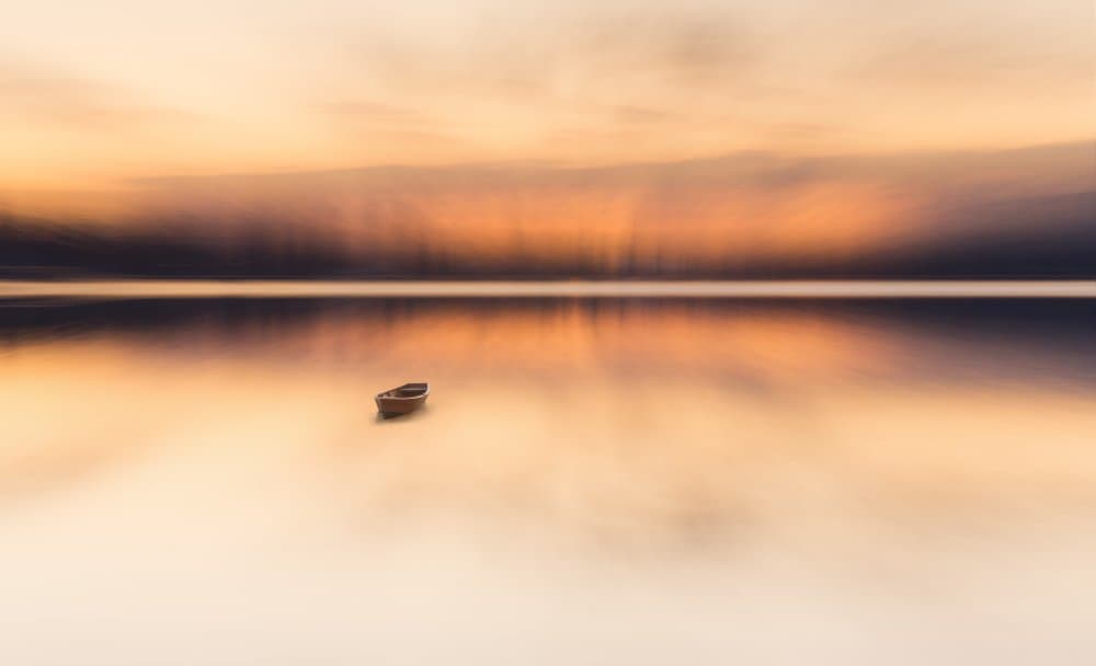 Serene Golden Boat by Uschi Hermann — canvas wall art