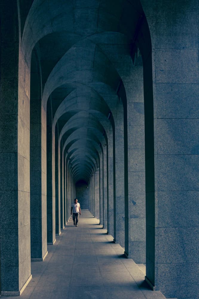 Man in Deep Archway by Ramiz Sahin — canvas wall art